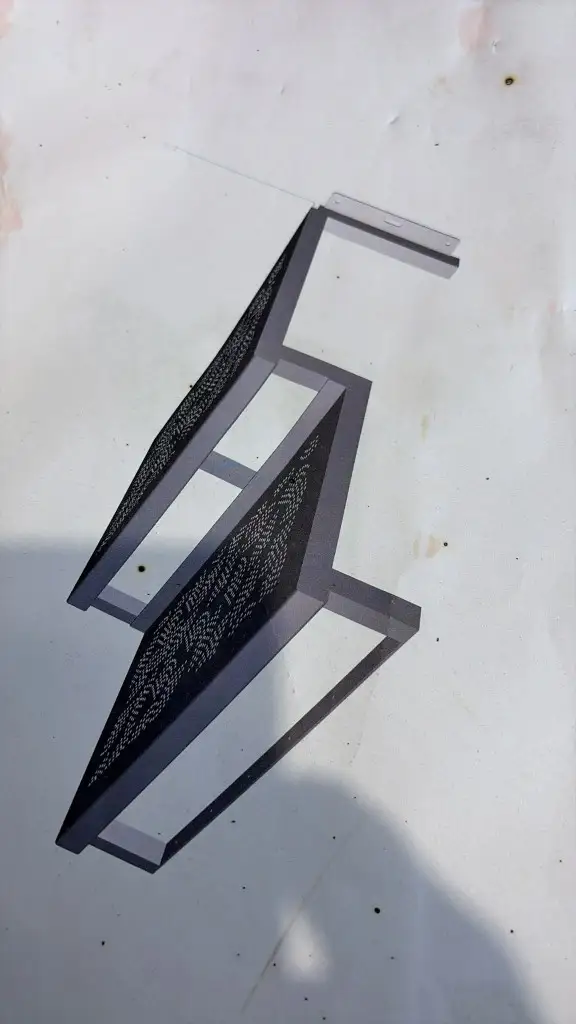 CAD view of a two-step pond staircase with perforated treads and a square-tube frame